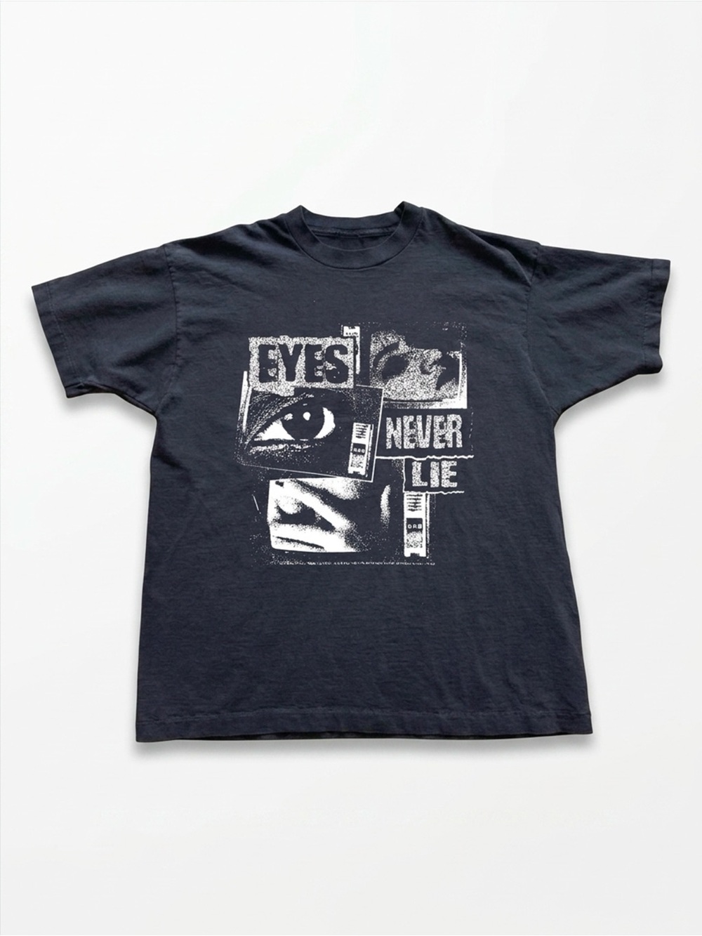 Gildan Black Short Sleeve Tee with White Graphic 'Eyes Never Lie'